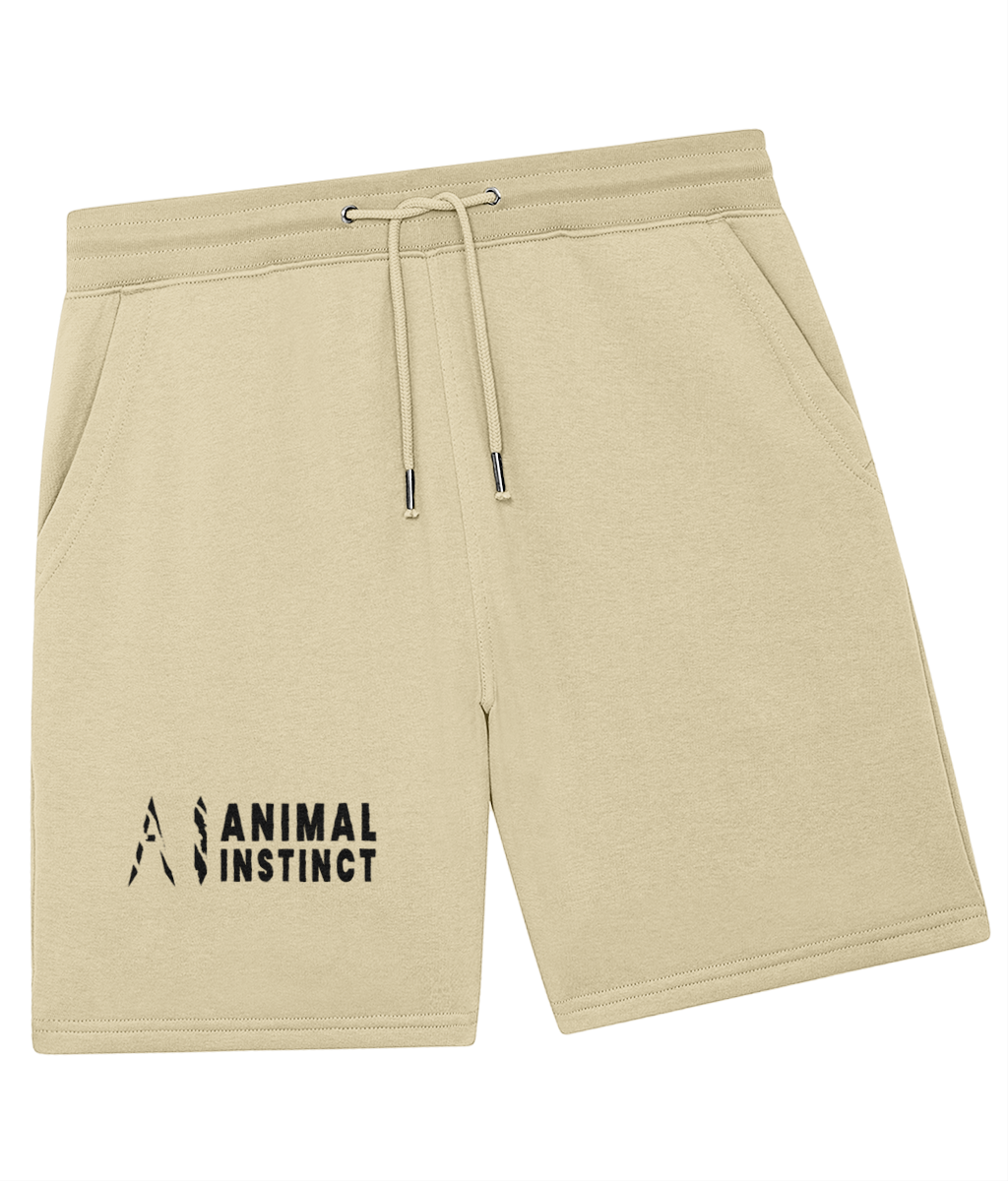 Animal Instinct Trainer Shorts in beige with black AI logo and animal instincts written in black on the lower left leg